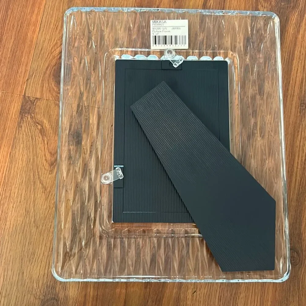 New in box MIKASA Glass beveled Picture frame. Great for weddings.